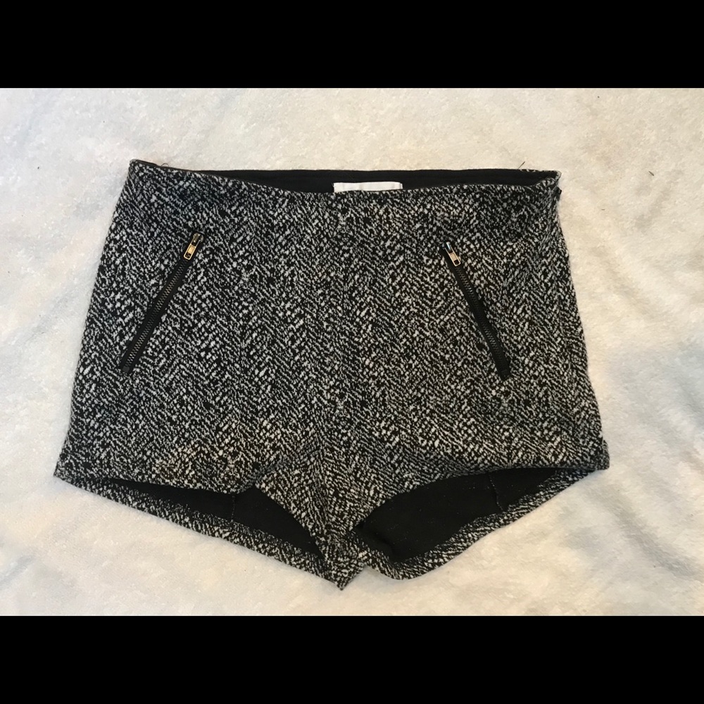 Wool shorts with zippered pockets.